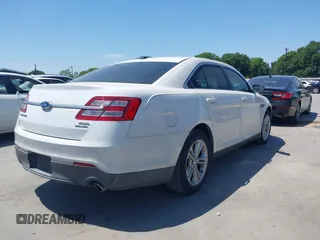 2013 Ford Taurus SEL with VIN 1FAHP2E83DG212029, listed as a IAAI auction lot 42020548 with 172,887 mi miles. Bid and sale history available at carsss.com. Image 4.
