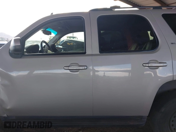 2007 GMC Yukon SLE with VIN 1GKFK13057J108533, listed as a IAAI auction lot 41364196 with 207,890 mi miles. Bid and sale history available at carsss.com. Image 14.