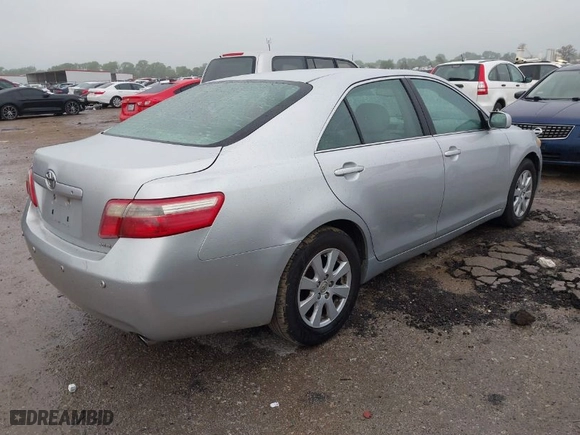 2007 Toyota Camry CE with VIN 4T1BE46K57U075558, listed as a IAAI auction lot 41948885 with 275,636 mi miles. Bid and sale history available at carsss.com. Image 4.
