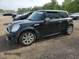 2012 MINI Hardtop S with VIN WMWSV3C57CTY17355, listed as a Copart auction lot 63561395 with 157,122 mi miles and Clean title. Bid and sale history available at DreamBid. Image 1.
