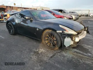 2011 Nissan 370Z Touring with VIN JN1AZ4EH6BM550267, listed as a Copart auction lot 82245804 with 124,466 mi miles and Salvage Title. Bid and sale history available at carsss.com. Image 4.