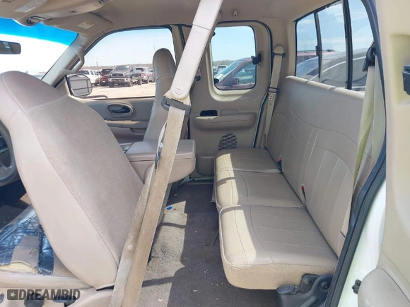 2000 Ford F-150 XL with VIN 1FTRX18W6YNA72319, listed as a IAAI auction lot 41682748 with 265,559 mi miles. Bid and sale history available at carsss.com. Image 14.