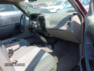 2002 Mazda B-Series Truck SX with VIN 4F4YR12D02TM01264, listed as a IAAI auction lot 41908459 with 205,445 mi miles and . Bid and sale history available at DreamBid. Image 5.