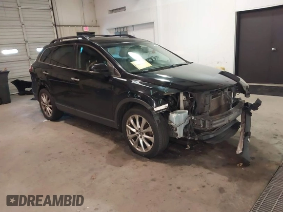 2015 Mazda CX-9 Grand Touring with VIN JM3TB3DV3F0460493, listed as a IAAI auction lot 41053565 with 213,124 mi miles. Bid and sale history available at carsss.com. Image 1.