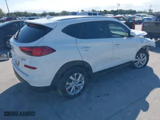 2019 Hyundai Tucson Value with VIN KM8J33A42KU024497, listed as a IAAI auction lot 41607693 with 70,792 mi miles. Bid and sale history available at carsss.com. Image 4.
