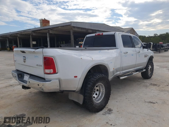 2015 Ram 3500 Laramie with VIN 3C63RRJL2FG661749, listed as a Copart auction lot 71062544 with 126,775 mi miles and Salvage Title. Bid and sale history available at carsss.com. Image 3.