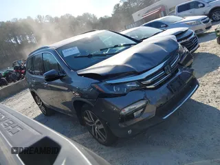 2016 Honda Pilot Elite with VIN 5FNYF6H01GB050555, listed as a IAAI auction lot 41670197 with 140,000 mi miles. Bid and sale history available at carsss.com. Image 1.