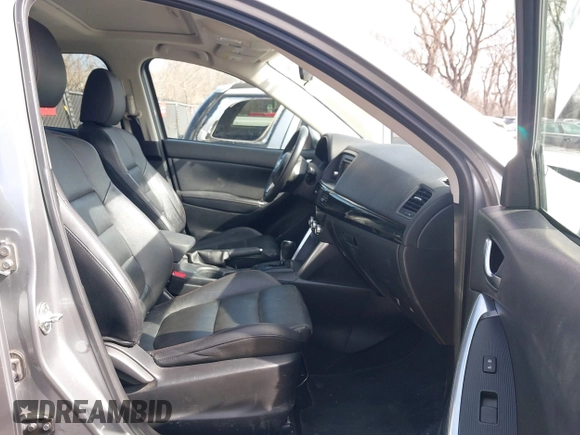2014 Mazda CX-5 Grand Touring with VIN JM3KE2DY8E0375025, listed as a IAAI auction lot 41657755 with 103,601 mi miles. Bid and sale history available at carsss.com. Image 5.