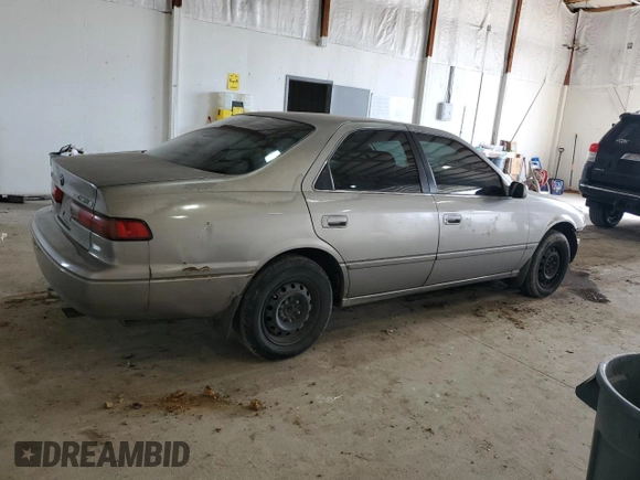 1997 Toyota Camry LE с VIN 4T1BG22K2VU087152, выставлен на аукционе Copart как лот 54049895 с пробегом 229 520 миль миль и Списание • Salvage title. История ставок и продаж доступна на DreamBid. Изображение 3.