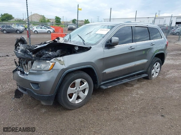 2011 Jeep Grand Cherokee Laredo with VIN 1J4RR4GG3BC718953, listed as a IAAI auction lot 39421353 with 1 mi miles. Bid and sale history available at carsss.com. Image 2.