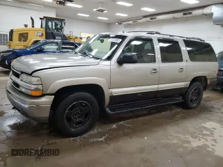 2002 Chevrolet Suburban LT z VIN 1GNFK16Z12J207923, wystawiony jako Copart lot #57557065 z przebiegiem 345 519 mil mil oraz Czysty tytuł • Clean title. Historia ofert i sprzedaży dostępna na DreamBid. Obrazek 1.