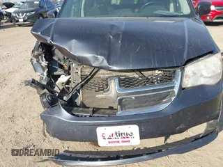 2013 Dodge Grand Caravan SXT with VIN 2C4RDGCG4DR602893, listed as a IAAI auction lot 41747242 with 206,213 mi miles and . Bid and sale history available at DreamBid. Image 6.