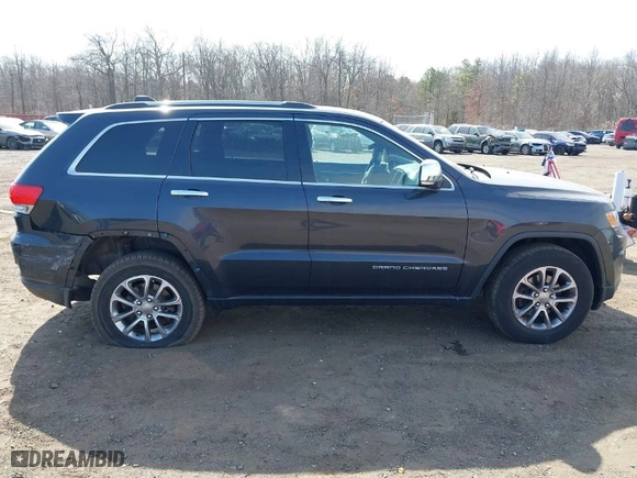 2015 Jeep Grand Cherokee Limited with VIN 1C4RJFBG0FC820717, listed as a IAAI auction lot 41781708 with 137,652 mi miles. Bid and sale history available at carsss.com. Image 13.
