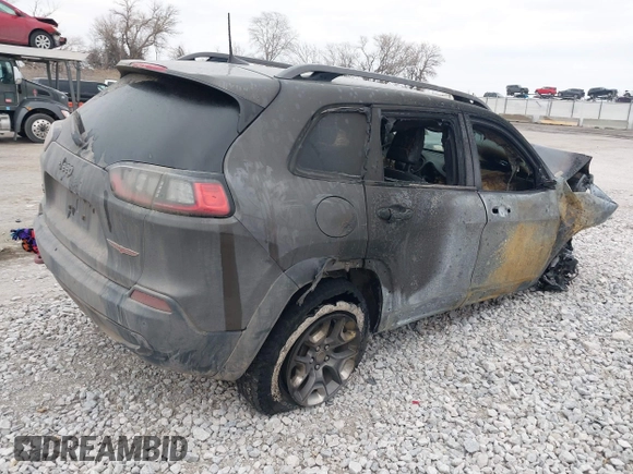 2019 Jeep Cherokee Trailhawk Elite with VIN 1C4PJMBX9KD329661, listed as a IAAI auction lot 41704933 with 1 mi miles. Bid and sale history available at carsss.com. Image 4.