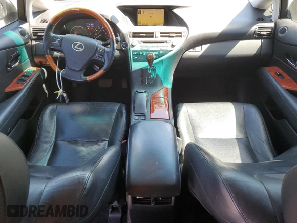 2011 Lexus RX 450h with VIN JTJBC1BAXB2034849, listed as a Copart auction lot 62915265 with 168,558 mi miles and Salvage title. Bid and sale history available at DreamBid. Image 8.