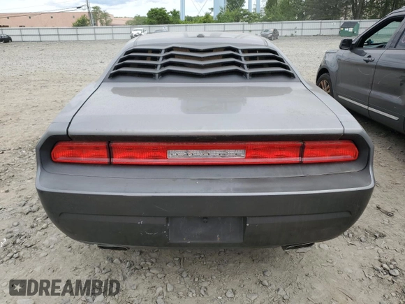 2011 Dodge Challenger z VIN 2B3CJ4DG5BH570472, wystawiony jako Copart lot #58479265 z przebiegiem Nie podano mil oraz Szkoda całkowita • Salvage title. Historia ofert i sprzedaży dostępna na DreamBid. Obrazek 6.