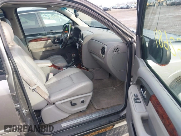 2005 GMC Envoy SLT with VIN 1GKDT13S752276414, listed as a IAAI auction lot 41052684 with 200,919 mi miles. Bid and sale history available at carsss.com. Image 5.