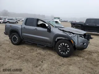 2024 Nissan Frontier PRO-4X with VIN 1N6ED1EK5RN627574, listed as a Copart auction lot 43977725 with 12,019 mi miles and Salvage Title. Bid and sale history available at carsss.com. Image 4.