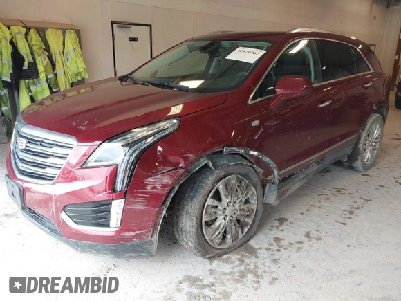 2018 Cadillac XT5 Premium Luxury AWD z VIN 1GYKNFRS6JZ114464, wystawiony jako IAAI lot #42320302 z przebiegiem 61 231 mil mil oraz . Historia ofert i sprzedaży dostępna na DreamBid. Obrazek 18.