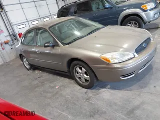 2006 Ford Taurus SE with VIN 1FAFP53U46A123827, listed as a IAAI auction lot 42042946 with 146,393 mi miles. Bid and sale history available at carsss.com. Image 1.