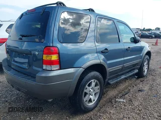 2005 Ford Escape XLT with VIN 1FMYU03195KB77469, listed as a IAAI auction lot 42292011 with 225,358 mi miles and . Bid and sale history available at DreamBid. Image 4.