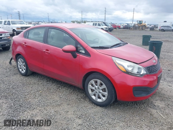 2013 Kia Rio LX with VIN KNADM4A30D6179274, listed as a IAAI auction lot 42014845 with 115,238 mi miles. Bid and sale history available at carsss.com. Image 1.