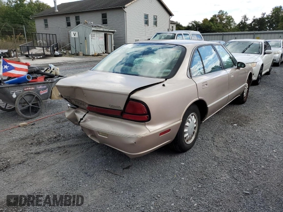 1998 Oldsmobile 88 LS z VIN 1G3HN52K0W4857890, wystawiony jako Copart lot #56019374 z przebiegiem 170 105 mil mil oraz Szkody całkowita. Historia ofert i sprzedaży dostępna na DreamBid. Obrazek 4.