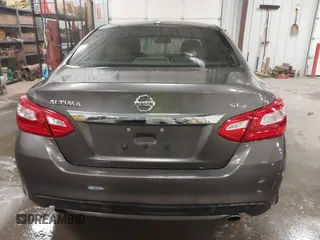 2016 Nissan Altima 2.5 S with VIN 1N4AL3AP4GC145811, listed as a IAAI auction lot 41424415 with 124,224 mi miles. Bid and sale history available at carsss.com. Image 17.