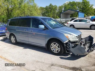 2006 Honda Odyssey Touring z VIN 5FNRL388X6B009356, wystawiony jako Copart lot #55991335 z przebiegiem 101 816 mil mil oraz Szkoda całkowita • Salvage title. Historia ofert i sprzedaży dostępna na DreamBid. Obrazek 4.