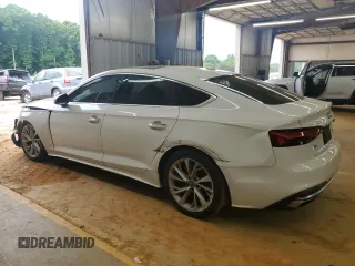 2020 Audi A5 Sportback Premium z VIN WAUANCF5XLA007950, wystawiony jako Copart lot #56157805 z przebiegiem 140 073 mil mil oraz Czysty tytuł • Clean title. Historia ofert i sprzedaży dostępna na DreamBid. Obrazek 2.