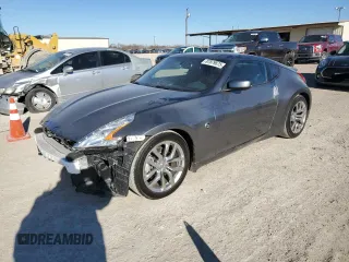 2014 Nissan 370Z Nismo with VIN JN1AZ4EH6EM633797, listed as a Copart auction lot 87879675 with 21,410 mi miles and Salvage Title. Bid and sale history available at DreamBid. Image 1.