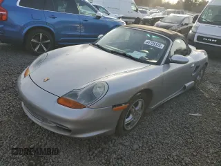 2000 Porsche Boxster z VIN WP0CA2980YU626179, wystawiony jako Copart lot #44728325 z przebiegiem 103 173 mil mil oraz Szkody całkowita. Historia ofert i sprzedaży dostępna na DreamBid. Obrazek 1.