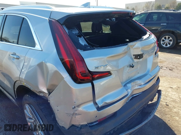 2019 Cadillac XT4 FWD Premium Luxury with VIN 1GYFZCR47KF110481, listed as a IAAI auction lot 41771338 with 103,124 mi miles. Bid and sale history available at carsss.com. Image 12.