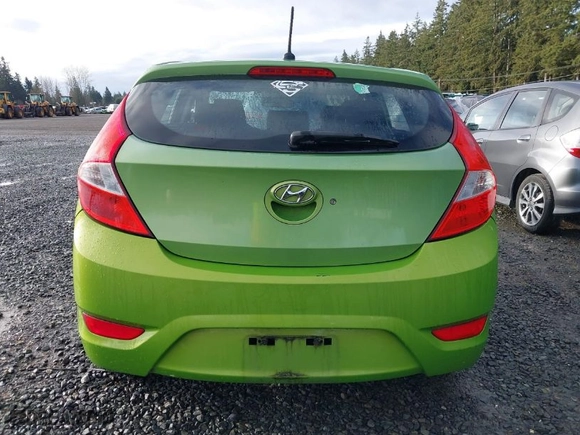 2012 Hyundai Accent GS with VIN KMHCT5AE9CU021238, listed as a IAAI auction lot 41762650 with 166,287 mi miles. Bid and sale history available at carsss.com. Image 17.