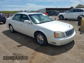 2002 Cadillac DeVille with VIN 1G6KD54Y42U141596, listed as a IAAI auction lot 41989690 with 169,862 mi miles. Bid and sale history available at carsss.com. Image 1.