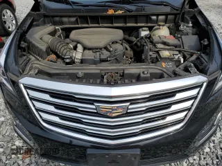 2019 Cadillac XT5 Luxury AWD z VIN 1GYKNDRS4KZ185376, wystawiony jako Copart lot #54388275 z przebiegiem 76 465 mil mil oraz Szkoda całkowita • Salvage title. Historia ofert i sprzedaży dostępna na DreamBid. Obrazek 12.