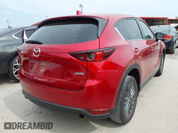 2017 Mazda CX-5 Touring with VIN JM3KFACL2H0197985, listed as a IAAI auction lot 42069182 with 184,734 mi miles. Bid and sale history available at carsss.com. Image 4.