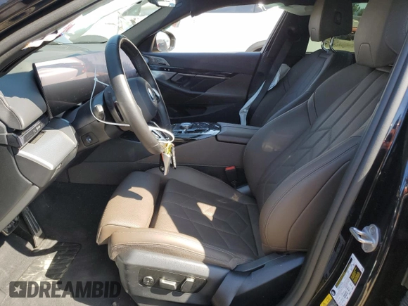 2024 BMW i5 eDrive40 with VIN WBY33FK03RCS14771, listed as a Copart auction lot 62393255 with 25,192 mi miles and Salvage title. Bid and sale history available at DreamBid. Image 7.