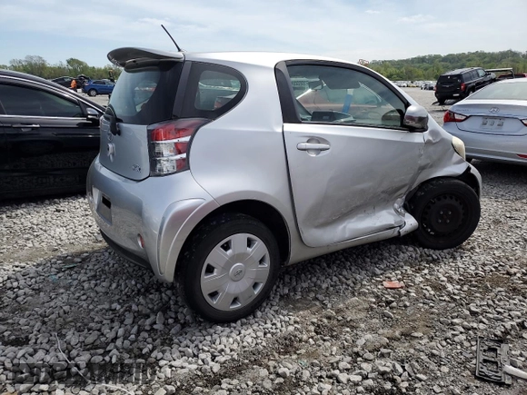 2012 Scion iQ with VIN JTNJJXB03CJ015321, listed as a Copart auction lot 54332355 with 63,439 mi miles and Salvage title. Bid and sale history available at DreamBid. Image 3.