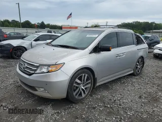 2012 Honda Odyssey Touring z VIN 5FNRL5H96CB022699, wystawiony jako Copart lot #60085235 z przebiegiem 154 948 mil mil oraz Szkoda całkowita • Salvage title. Historia ofert i sprzedaży dostępna na DreamBid. Obrazek 1.