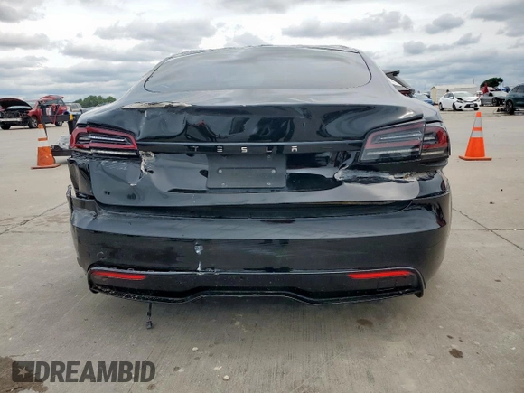 2023 Tesla Model S with VIN 5YJSA1E59PF512318, listed as a Copart auction lot 58377895 with 34,402 mi miles and Salvage title. Bid and sale history available at DreamBid. Image 6.