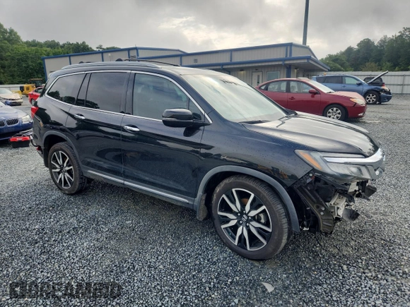 2019 Honda Pilot Elite with VIN 5FNYF6H05KB071031, listed as a Copart auction lot 60777585 with 96,155 mi miles and Salvage title. Bid and sale history available at DreamBid. Image 4.