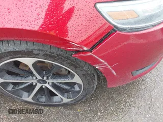 2014 Ford Taurus SEL z VIN 1FAHP2E83EG125622, wystawiony jako IAAI lot #42204238 z przebiegiem 134 032 mil mil oraz . Historia ofert i sprzedaży dostępna na DreamBid. Obrazek 20.