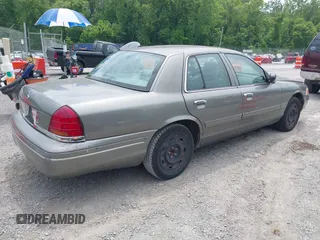 2003 Ford Crown Victoria Standard с VIN 2FAFP73WX3X182848, выставлен на аукционе IAAI как лот 42438856 с пробегом 169 707 миль миль и . История ставок и продаж доступна на DreamBid. Изображение 4.