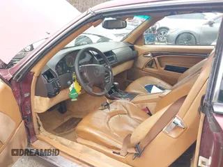 1997 Mercedes-Benz SL-Class with VIN WDBFA67F3VF142320, listed as a IAAI auction lot 41835593 with 172,151 mi miles. Bid and sale history available at carsss.com. Image 5.