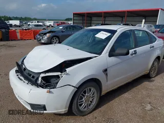 2008 Ford Focus SE with VIN 1FAHP35N18W265206, listed as a IAAI auction lot 42563966 with 122,103 mi miles and . Bid and sale history available at DreamBid. Image 2.
