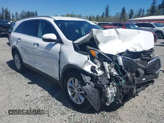 2016 Kia Sorento LX z VIN 5XYPGDA59GG025432, wystawiony jako IAAI lot #42064630 z przebiegiem 170 591 mil mil oraz . Historia ofert i sprzedaży dostępna na DreamBid. Obrazek 1.