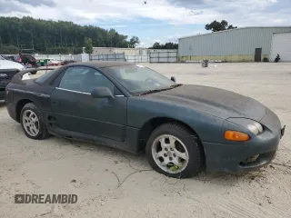 1997 Mitsubishi 3000GT z VIN JA3AM44H9VY001753, wystawiony jako Copart lot #76074634 z przebiegiem 114 056 mil mil oraz Czysty tytuł • Clean title. Historia ofert i sprzedaży dostępna na DreamBid. Obrazek 4.