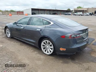 2016 Tesla Model S 90D with VIN 5YJSA1E27GF129824, listed as a IAAI auction lot 42058080 with 113,171 mi miles and . Bid and sale history available at DreamBid. Image 3.