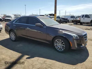 2014 Cadillac CTS Luxury AWD with VIN 1G6AX5S3XE0167903, listed as a Copart auction lot 53507035 with 119,179 mi miles and Clean Title. Bid and sale history available at DreamBid. Image 4.